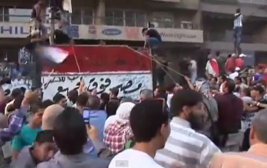 Protestors breach the Israeli Embassy's walls
